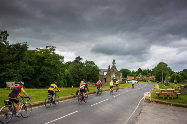 Cycling through Hutton-Le-Hole in North Yorkshire