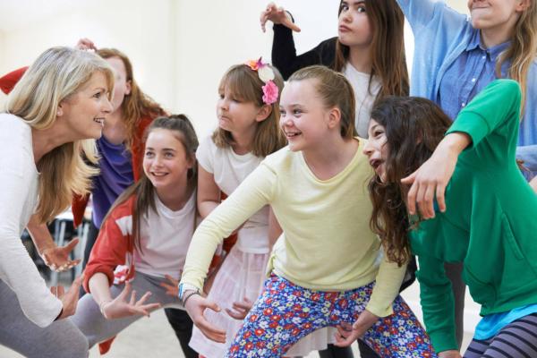 Children taking part in a drama workshop