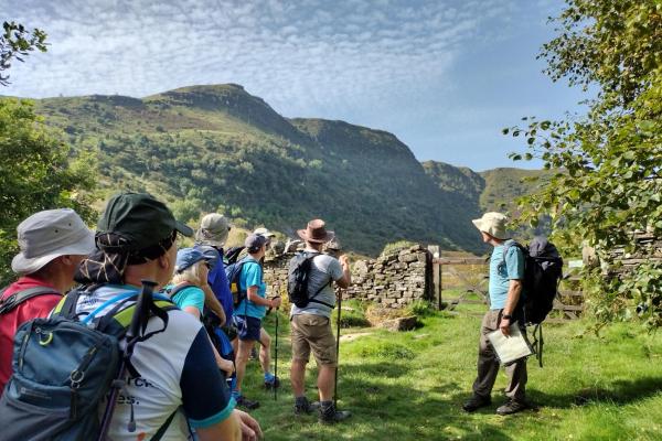 Walking group exploring Brecon Beacons