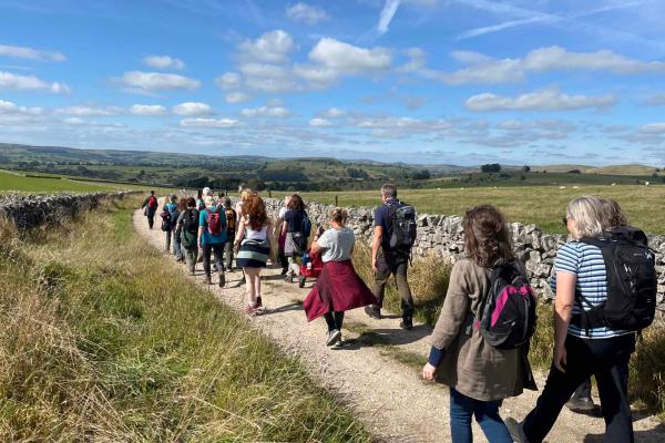 Group of people walking near YHA Hartington Hall