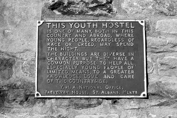 A plaque describing the diversity of hostels