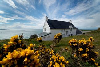 YHA Pwll Deri hostel and landscape YHA Pwll Deri exterior