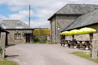 YHA Dartmoor courtyard and outdoor seating YHA Dartmoor exterior