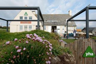 YHA Treyarnon Bay outdoor seating area YHA Treyarnon Bay External