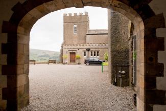 Archway to entrance of YHA Grinton Lodge YHA Grinton Lodge Exterior
