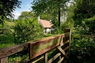 Gate to YHA Tanners Hatch YHA Tanners Hatch
