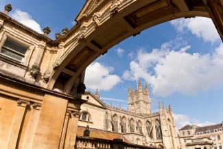 Grand archway next to Bath buildings