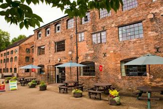 YHA Ironbridge Coalport hostel and outdoor seating YHA Ironbridge Coalport exterior