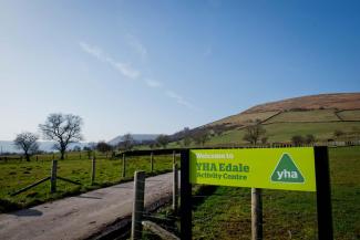 Welcome sign and driveway leading to YHA Edale YHA Edale Sign Image