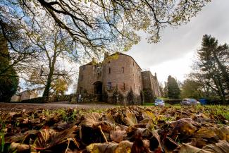 YHA St Briavels Castle exterior view in autumn YHA St Briavels