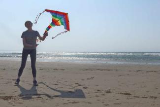 Jenny's daughter flying a kite on a Pembrokeshire beach Jenny's daughter flying a kite on a Pembrokeshire beach