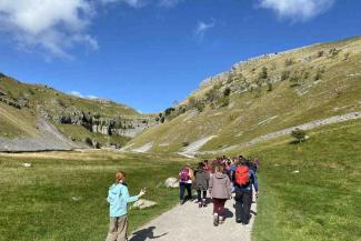 Group of young people walking in Malham, Yorkshire Dales Group of young people walking in Malham, Yorkshire Dales