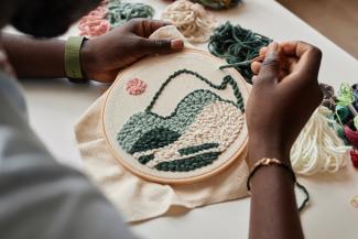 Person embroidering