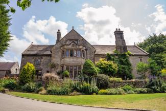 YHA Hartington Hall exterior on a sunny day