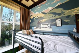 Bedroom with Lake District wall mural YHA Windermere bedroom designed by Interior Design Masters