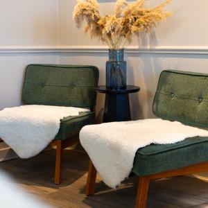YHA Port Eynon seating area with cosy blankets