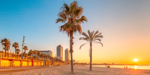 Sunsetting in the background of a beach front in Barcelona, Spain. 