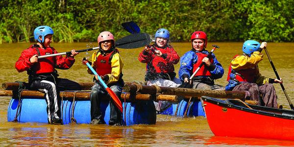 Group of children kayaking