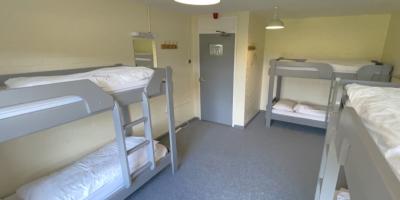 Bedroom with three bunk beds
