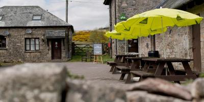 Outdoor seating area in YHA Dartmoor courtyard YHA Dartmoor external seating
