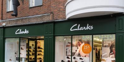 Clarks shop and a hanging Clarks Boot sign