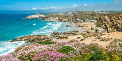 Bright blue ocean with a rocky beach
