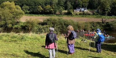 A group of people walking in Wye Valley