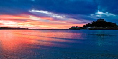 Pink sunset over a town