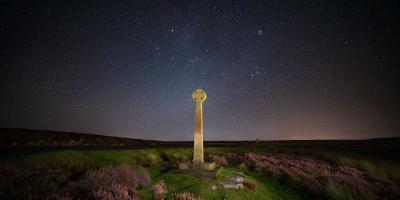 Milky way and foreground cross at North York Moors, Rosedale, UK