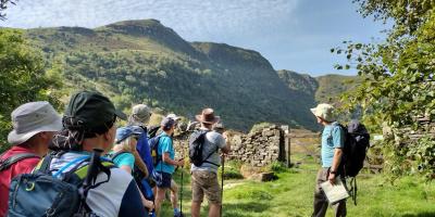 Walking group exploring Brecon Beacons