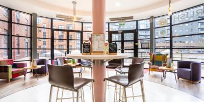 YHA Manchester reception area with seating