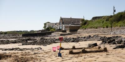 YHA Port Eynon exterior view with beach