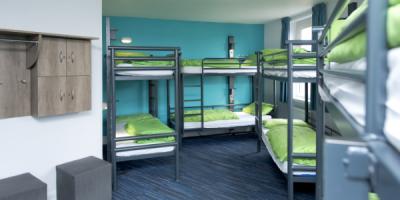 Bedroom with four sets of bunk beds