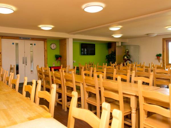Dining room with rows of tables and chairs