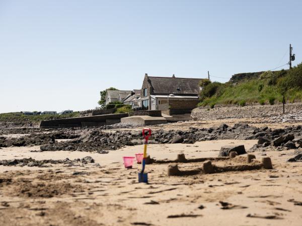 YHA Port Eynon exterior view with beach
