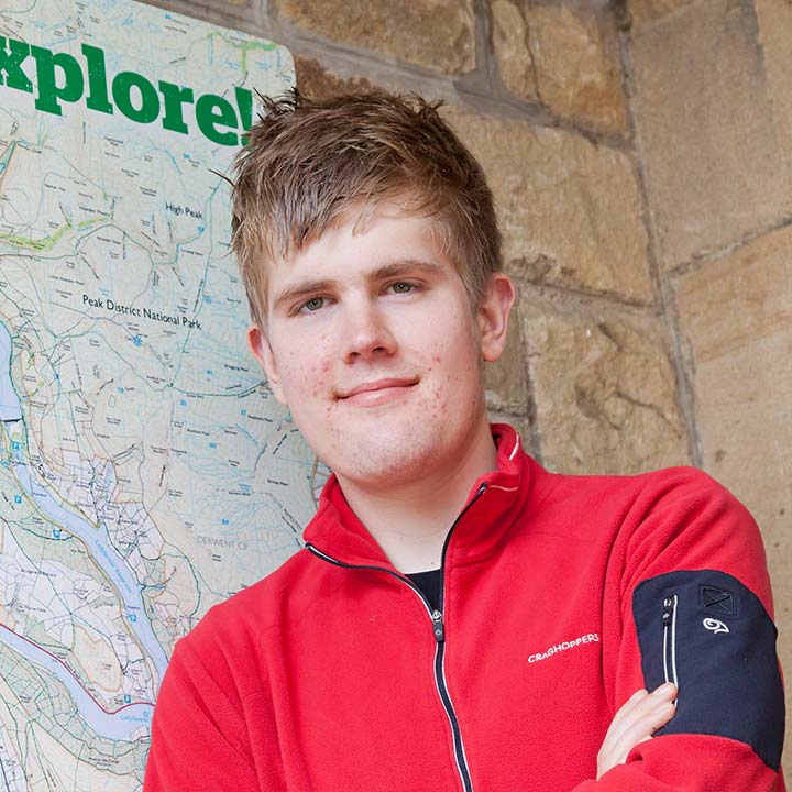 YHA Ambassador Alex Staniforth outside a youth hostel