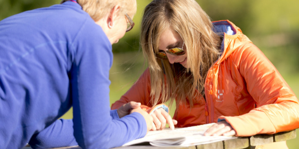 Two women looking at a map