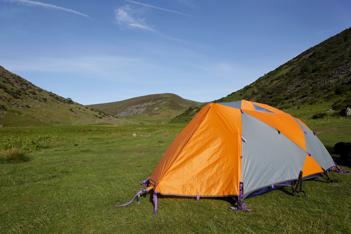 Tent in front of hills