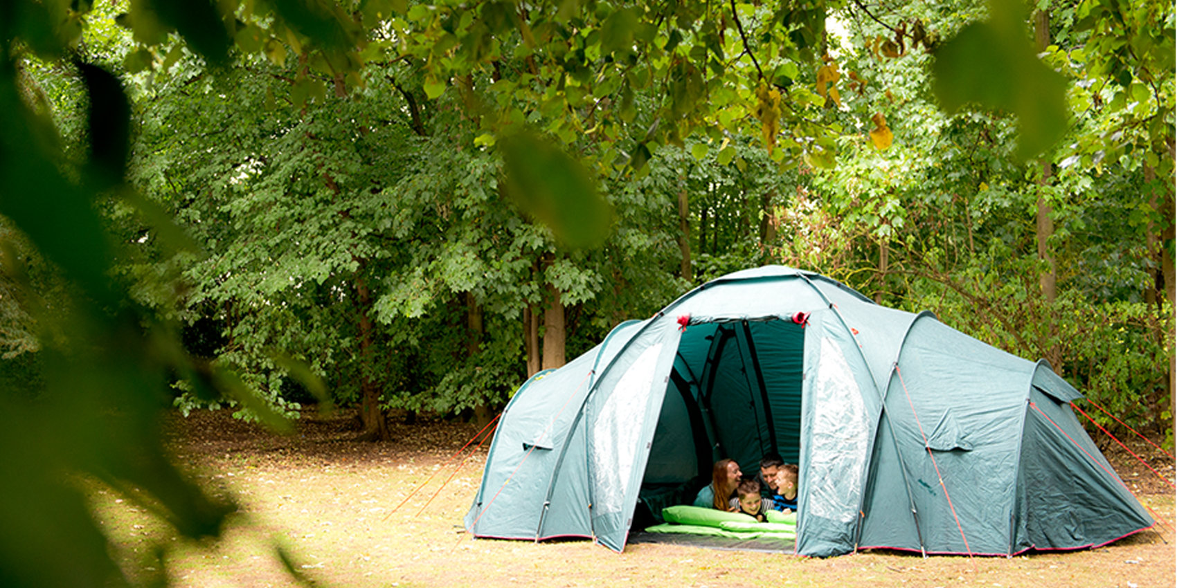 Family in a tent at YHA