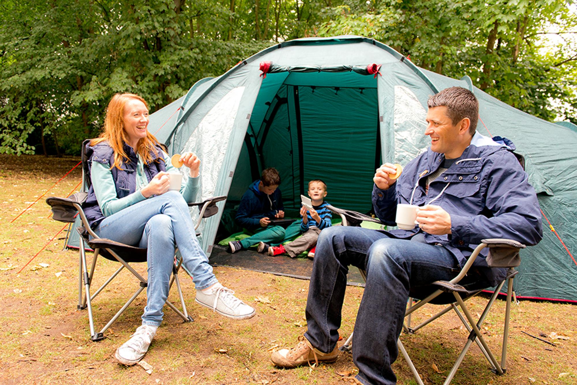 Family camping in tent