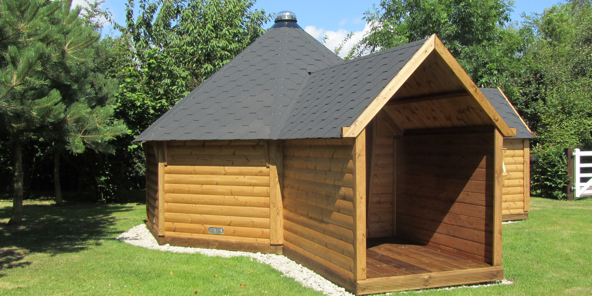 Wooden cabin on grass