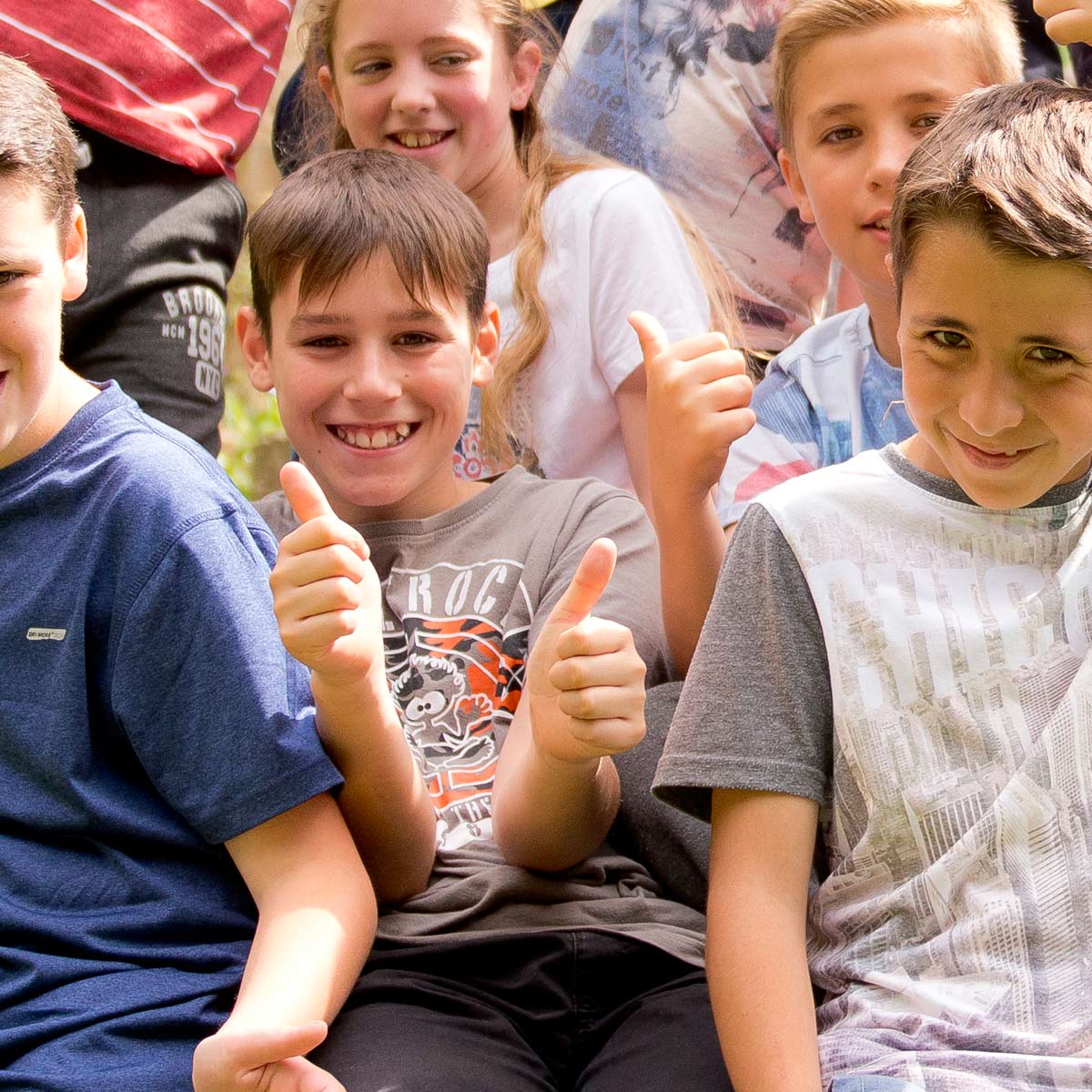 Group of happy young school children