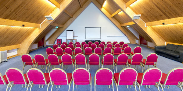 Rows of chairs in a meeting room