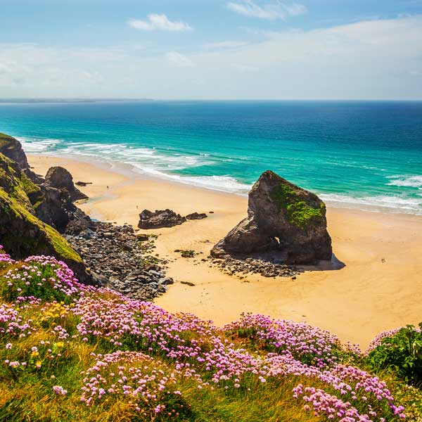 View over a Cornish beach from the cliff top